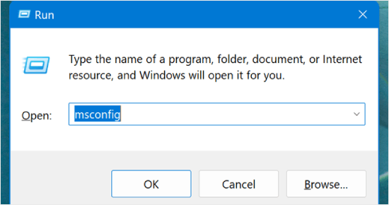 Typing msconfig in the Run window